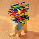 Balancing elephant with wooden pole - Image 2